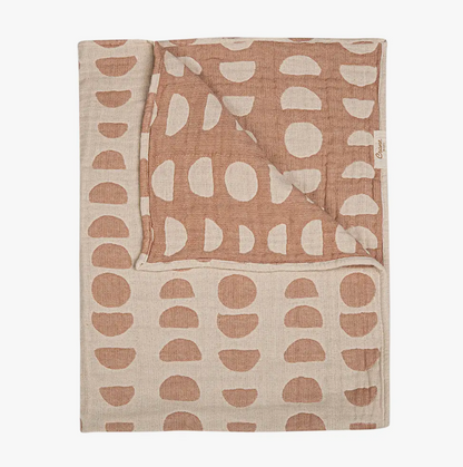 The Copper Moon Baby Swaddle Reversible Blanket