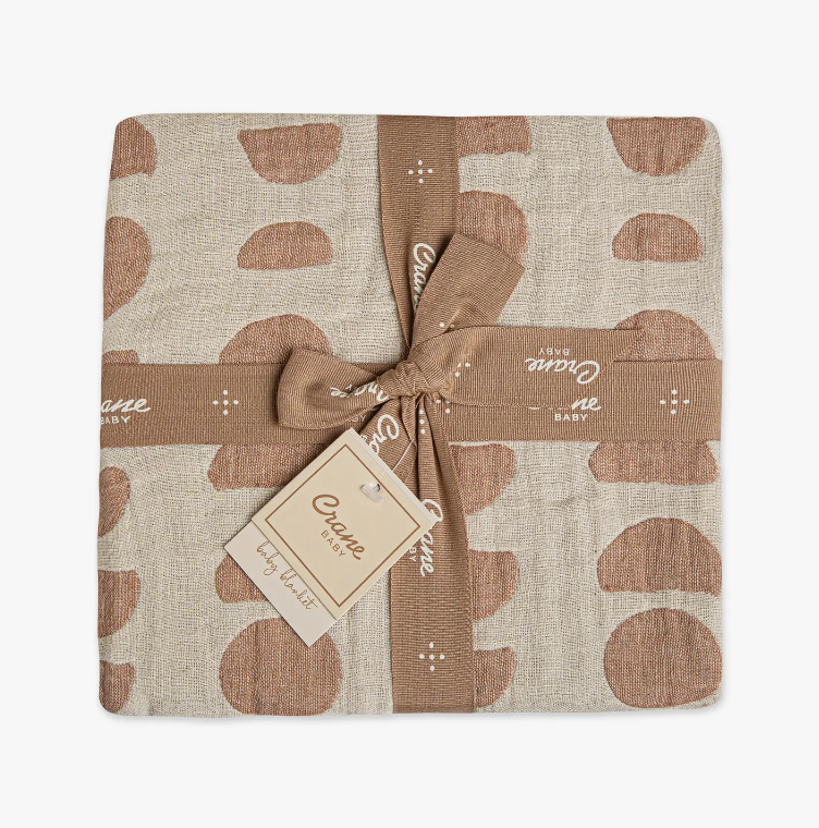 The Copper Moon Baby Swaddle Reversible Blanket