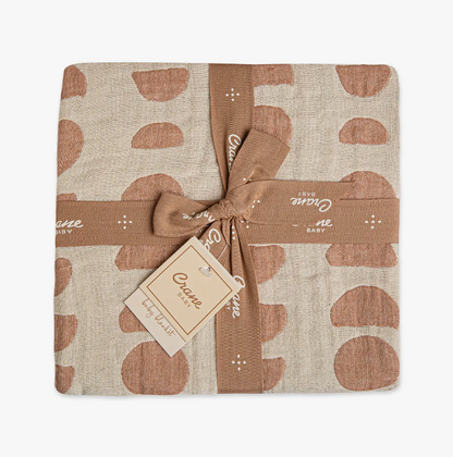 The Copper Moon Baby Swaddle Reversible Blanket